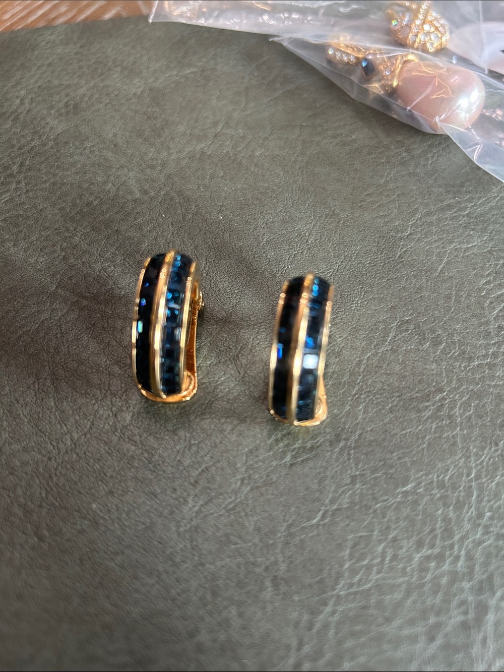 Nolan Miller, glamour collection Gold Tone Hoop Earrings with Blue Crystal Inlay